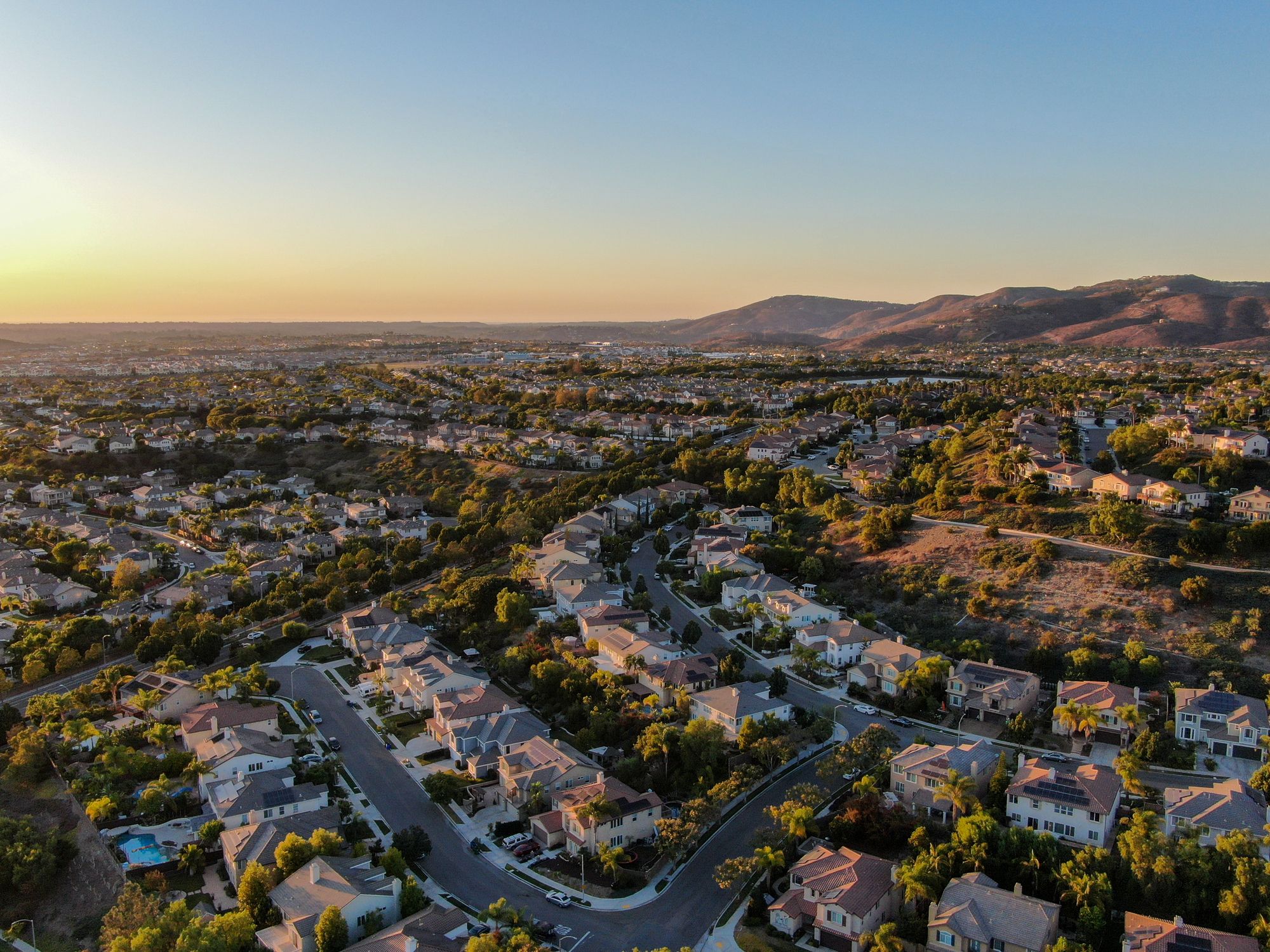 Neighborhood aerial view at dusk